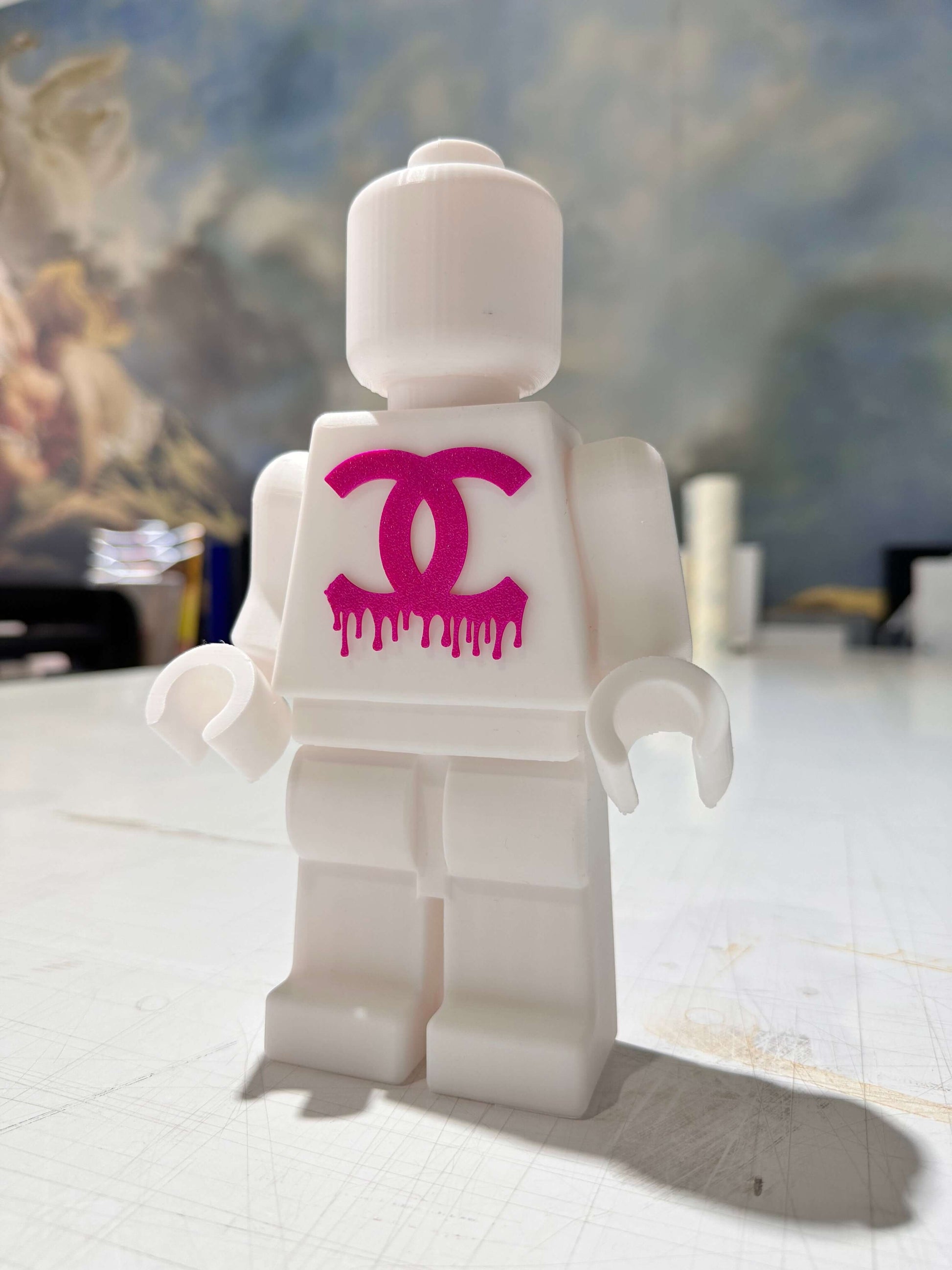 Mini figure Lego 3D stampata con logo CC in stile pop art, alta definizione e personalizzabile.