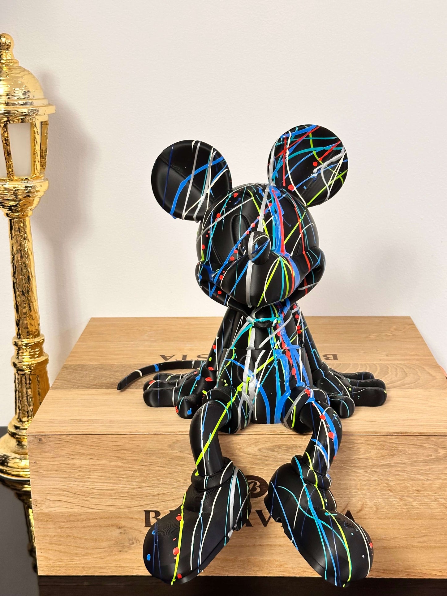 Mickey Mouse pop art statue in colorful splatter design, 3D printed, contemporary art piece for decoration.