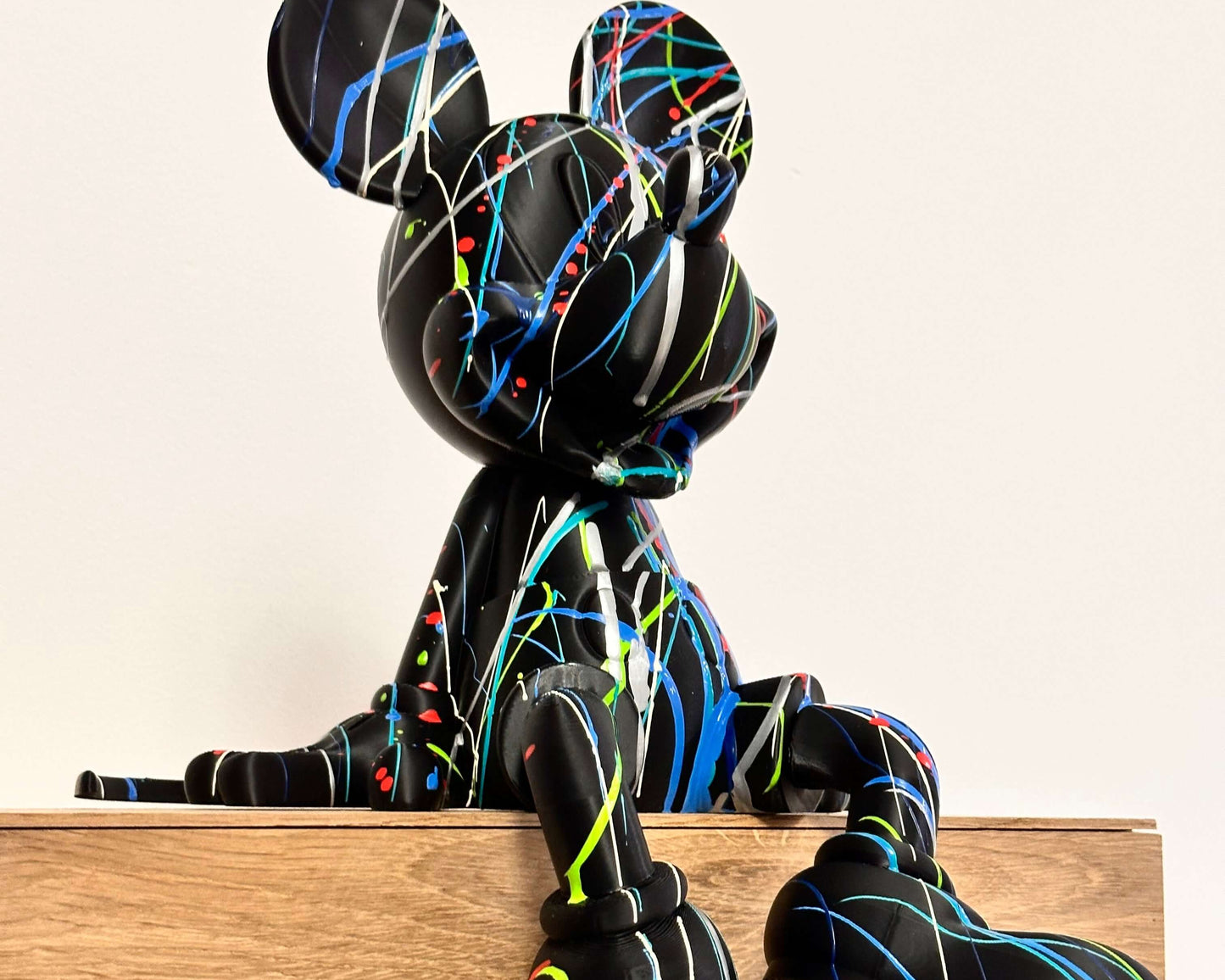 Mickey Mouse Pop Art statue in black with colorful splatters, 3D printed, handmade, unique collectible art piece.
