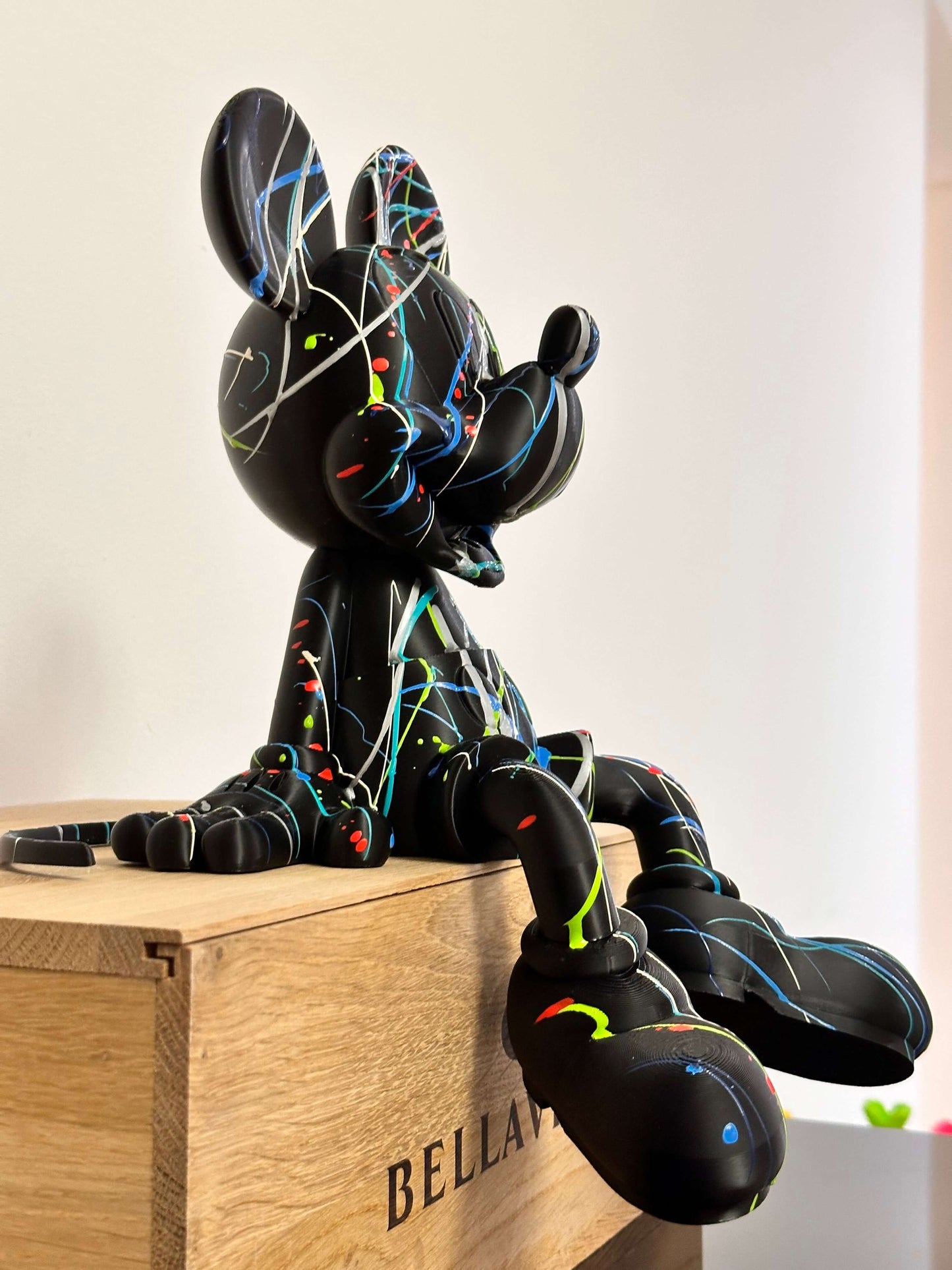 Mickey Mouse Pop Art statue, 3D printed, black with colorful splashes, artistic decor for collectors.