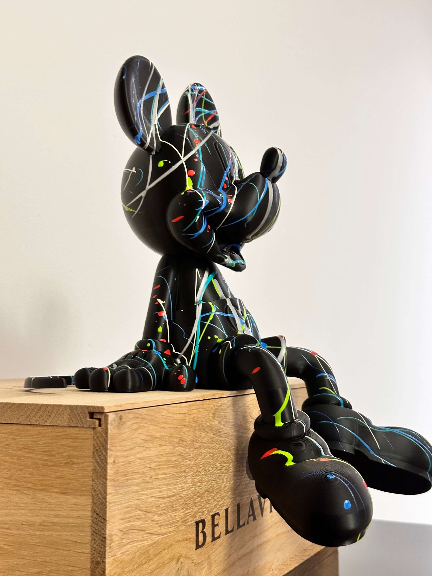 Mickey Mouse pop art statue, handcrafted and 3D printed, colorful abstract design, unique collectible piece.