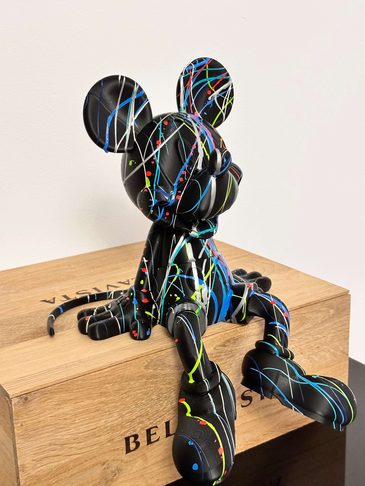 Mickey Mouse Pop Art statue in black with colorful paint splatters, handcrafted 3D printed art decor.