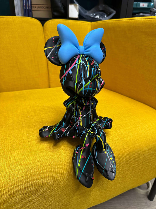 Minnie Mouse pop art statue, contemporary design with colorful splatter, perfect for cool interior decor.